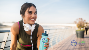 Woman hydrating with water after a workout, representing metabolism boost. 