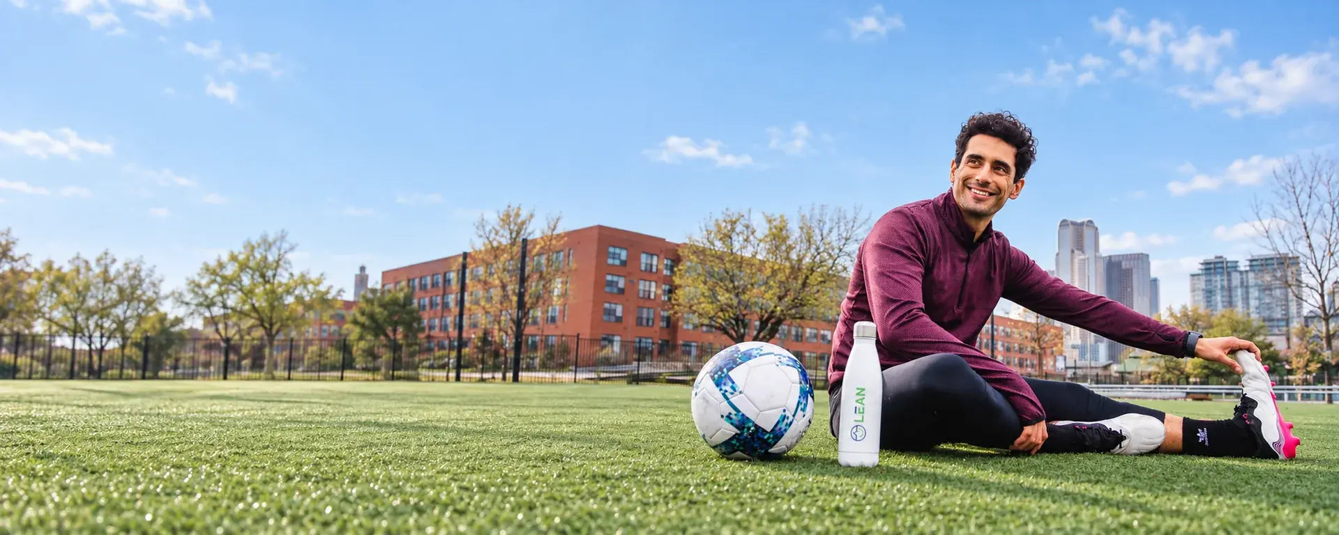 Soccer player taking a hydration break on the field